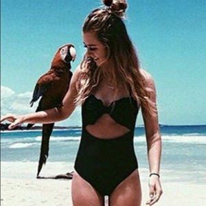 Black cut out swimsuit. New with tags!